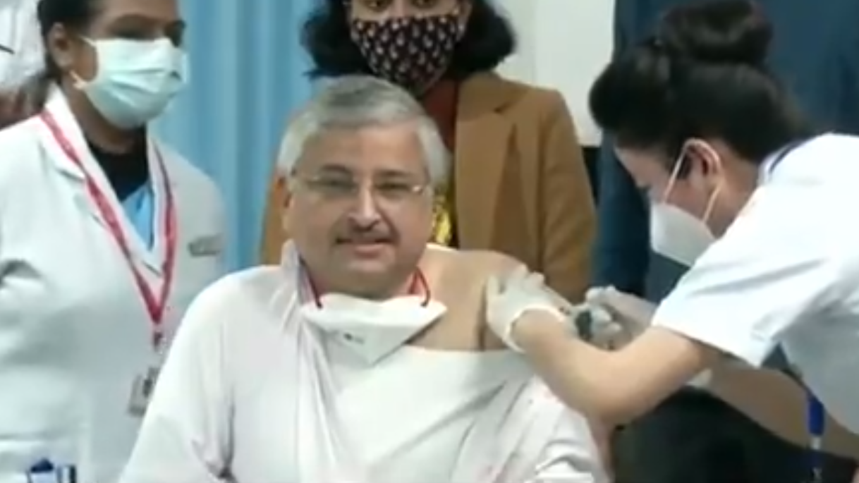 dr randeep guleria takes the covid vaccine shot